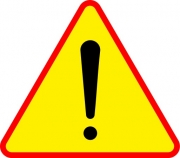 trójkątny znak: czarny wykrzyknik na żółtym tle, z czerwonym obramowaniem